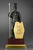 A very fine quality Empire gilt and patinated bronze and red marble figural clock of fourteen day duration attributed to Claude Galle